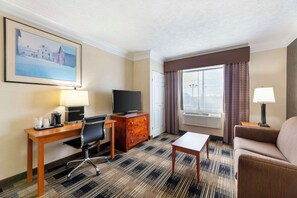Individually furnished, desk, laptop workspace, iron/ironing board
