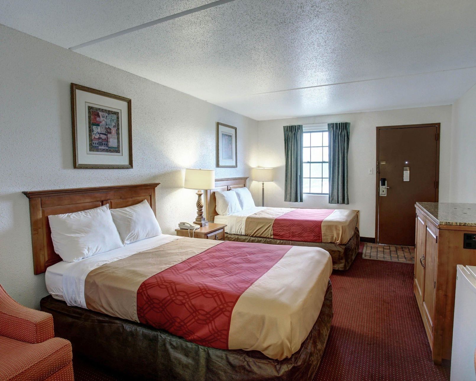 Desk, blackout drapes, iron/ironing board, rollaway beds