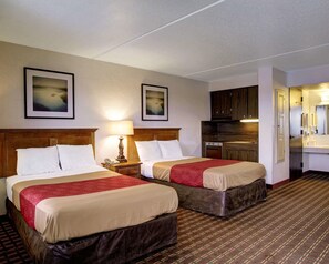 Desk, blackout drapes, iron/ironing board, rollaway beds