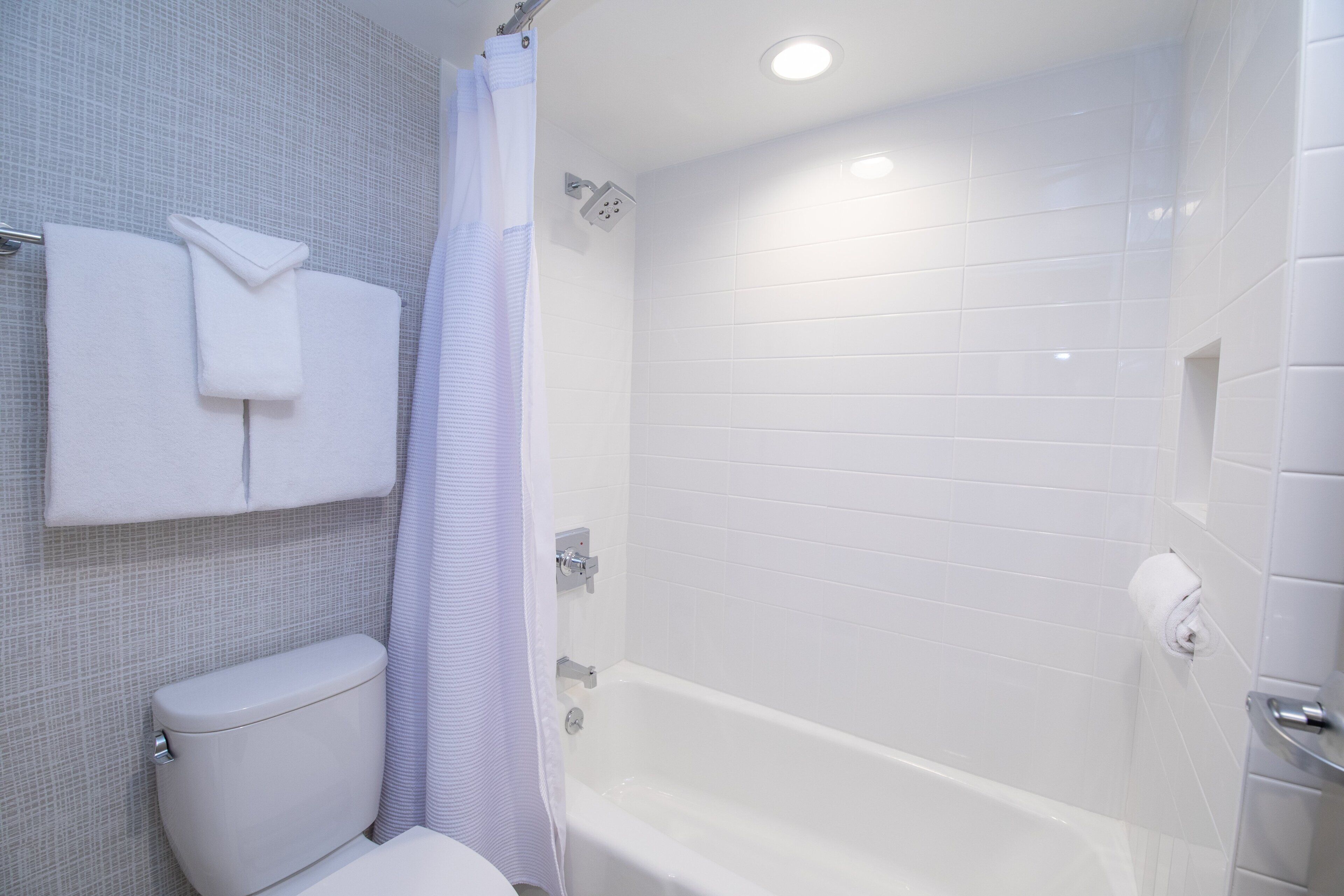 combined shower/bathtub, free toiletries, hair dryer, towels