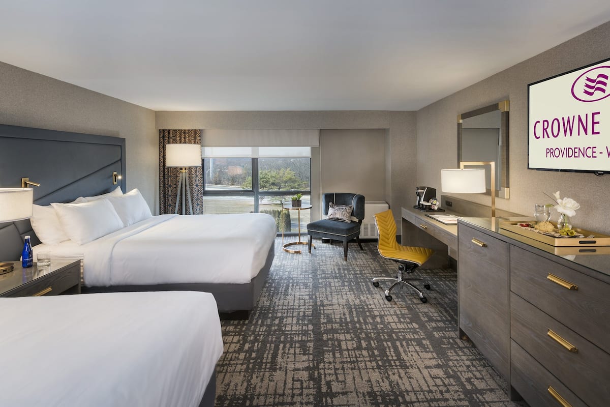 Premium bedding, pillow-top beds, desk, blackout curtains