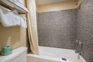 Room, Multiple Beds, Non Smoking | Bathroom | Combined shower/tub, hair dryer, towels - Knights Inn College Station (College Station)