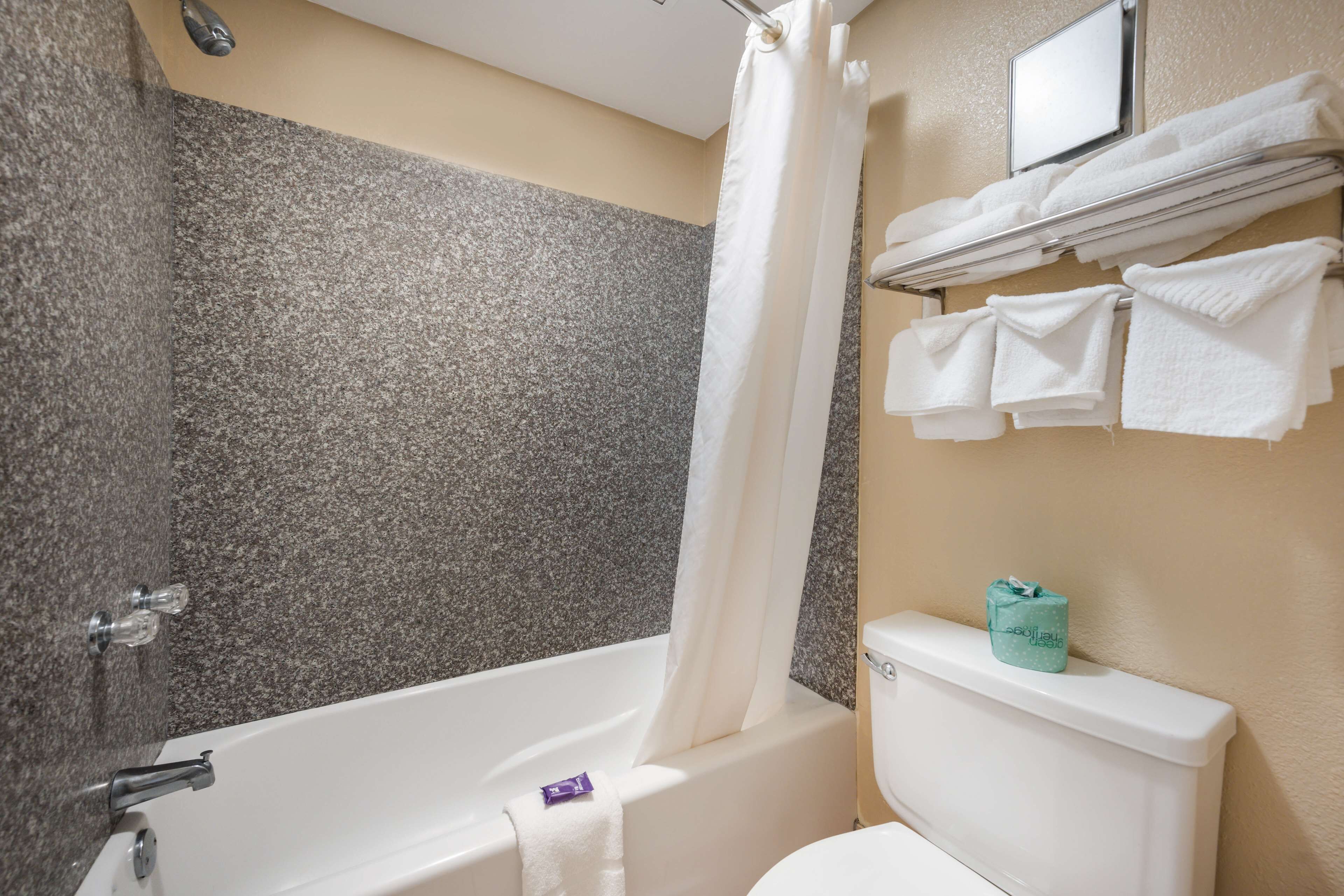 Room, 2 Queen Beds, Non Smoking | Bathroom | Combined shower/tub, hair dryer, towels