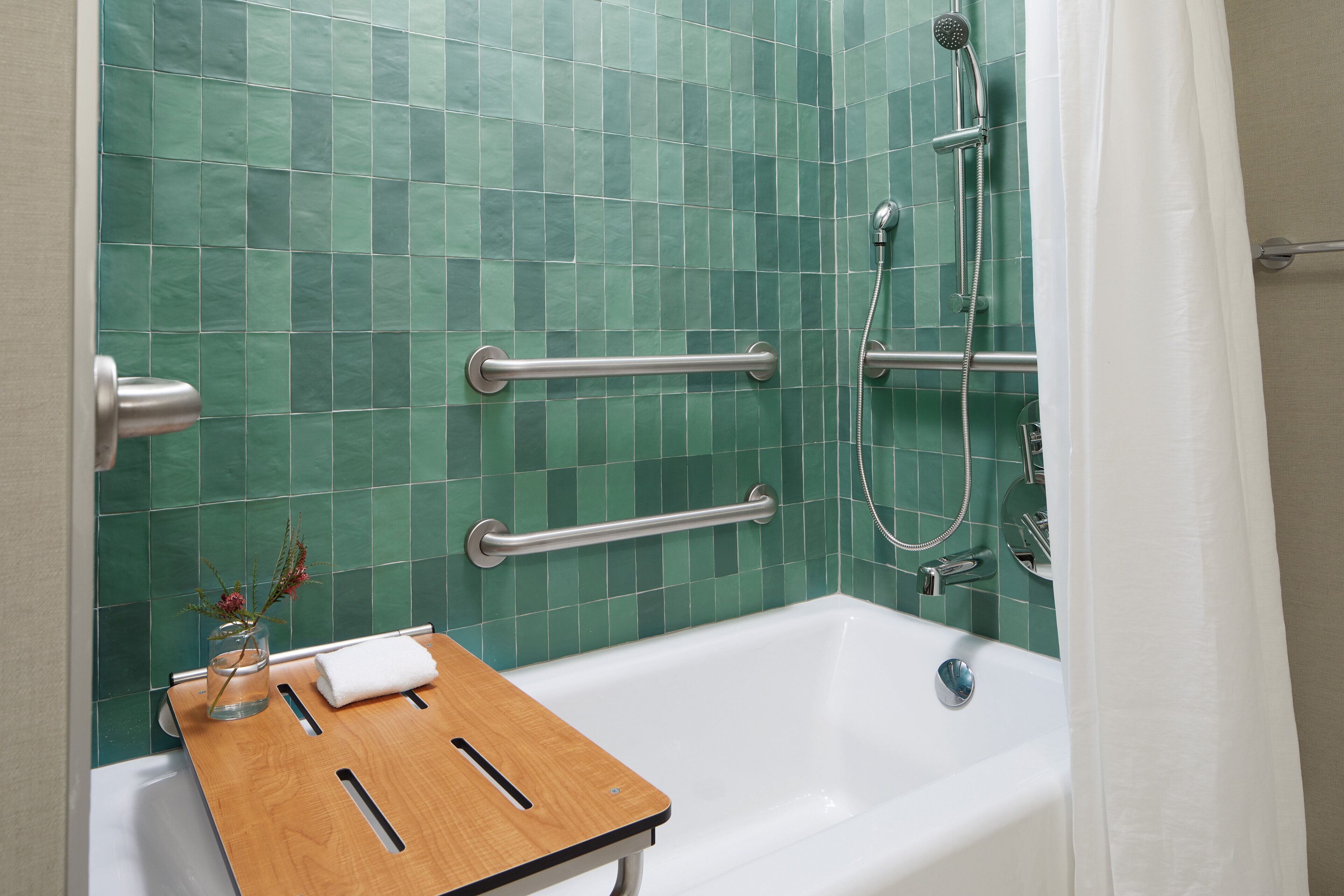 designer toiletries, hair dryer, bathrobes, slippers