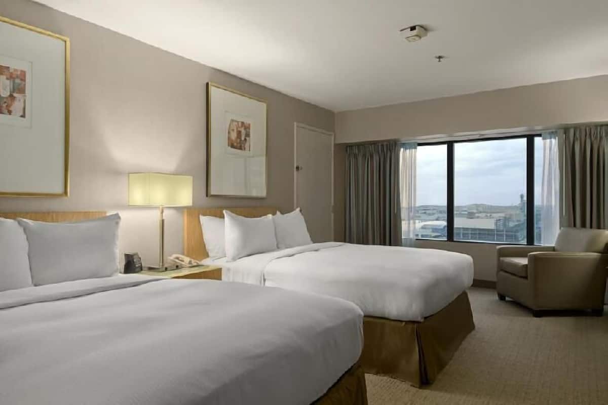 Premium bedding, pillow-top beds, in-room safe, desk