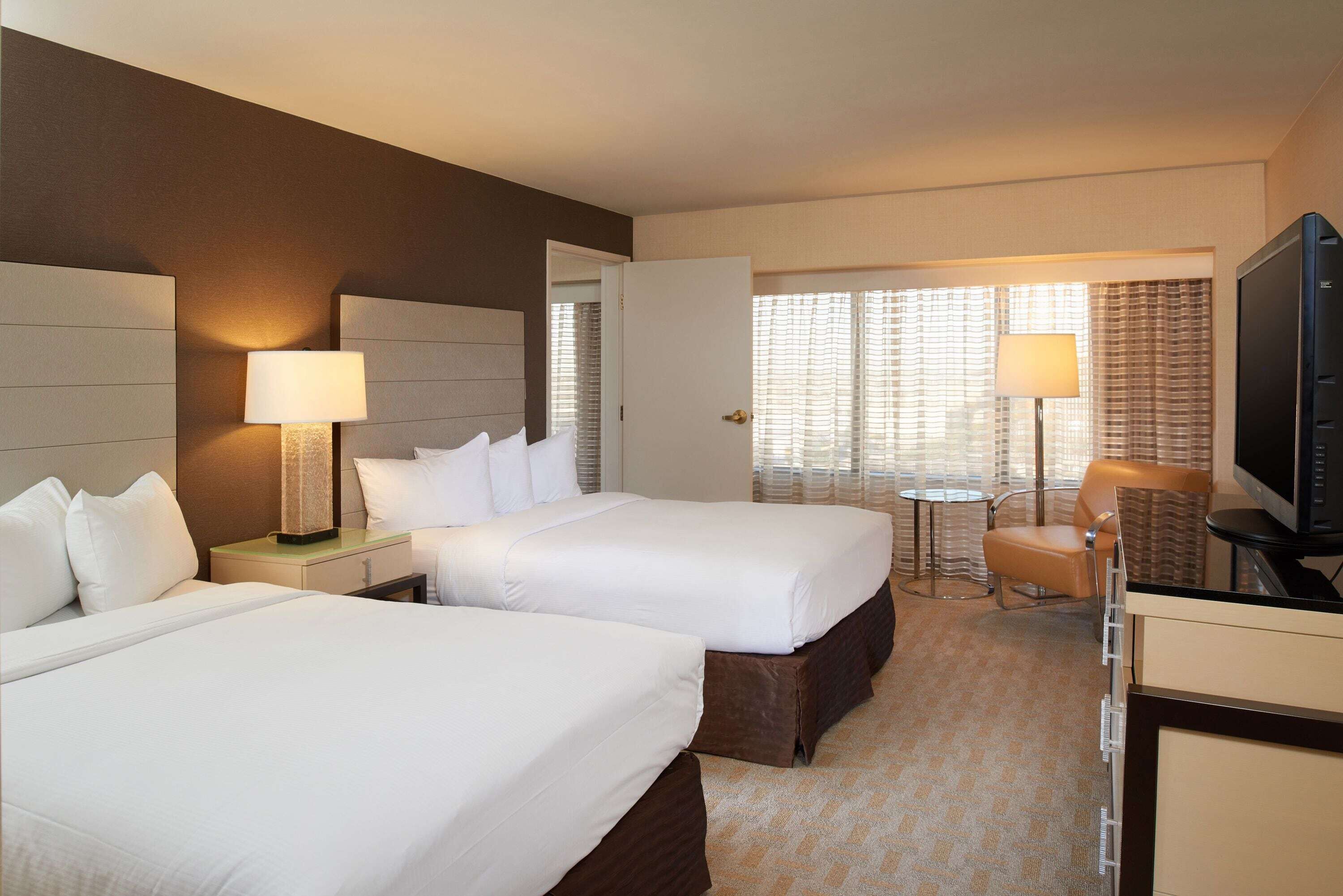 Premium bedding, pillow-top beds, in-room safe, desk