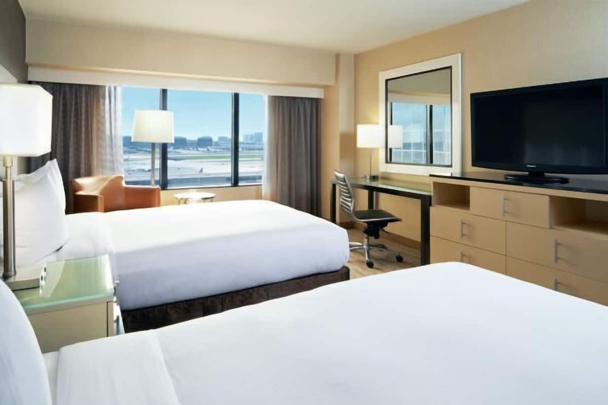Premium bedding, pillow-top beds, in-room safe, desk