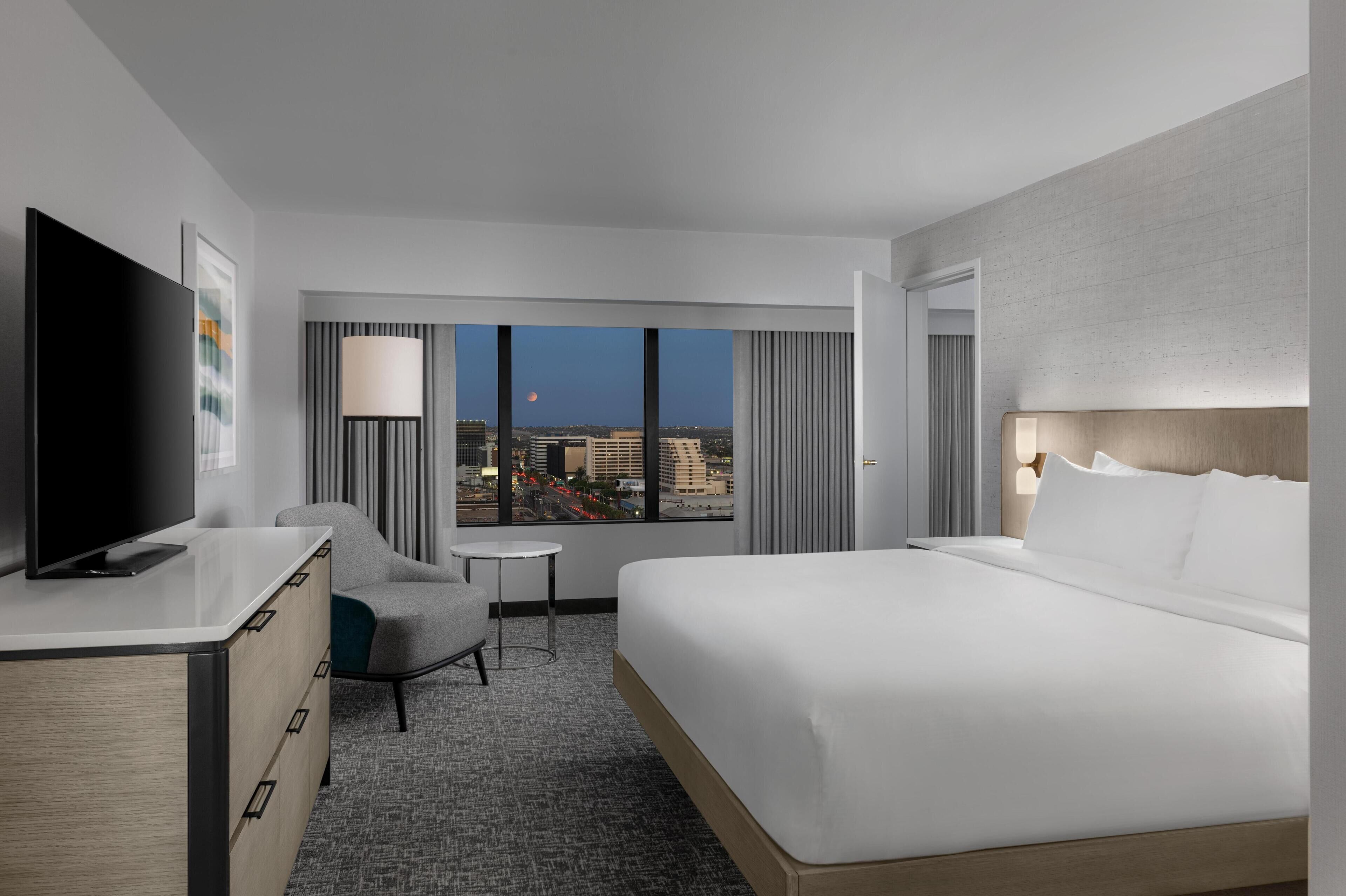 Premium bedding, pillow-top beds, in-room safe, desk