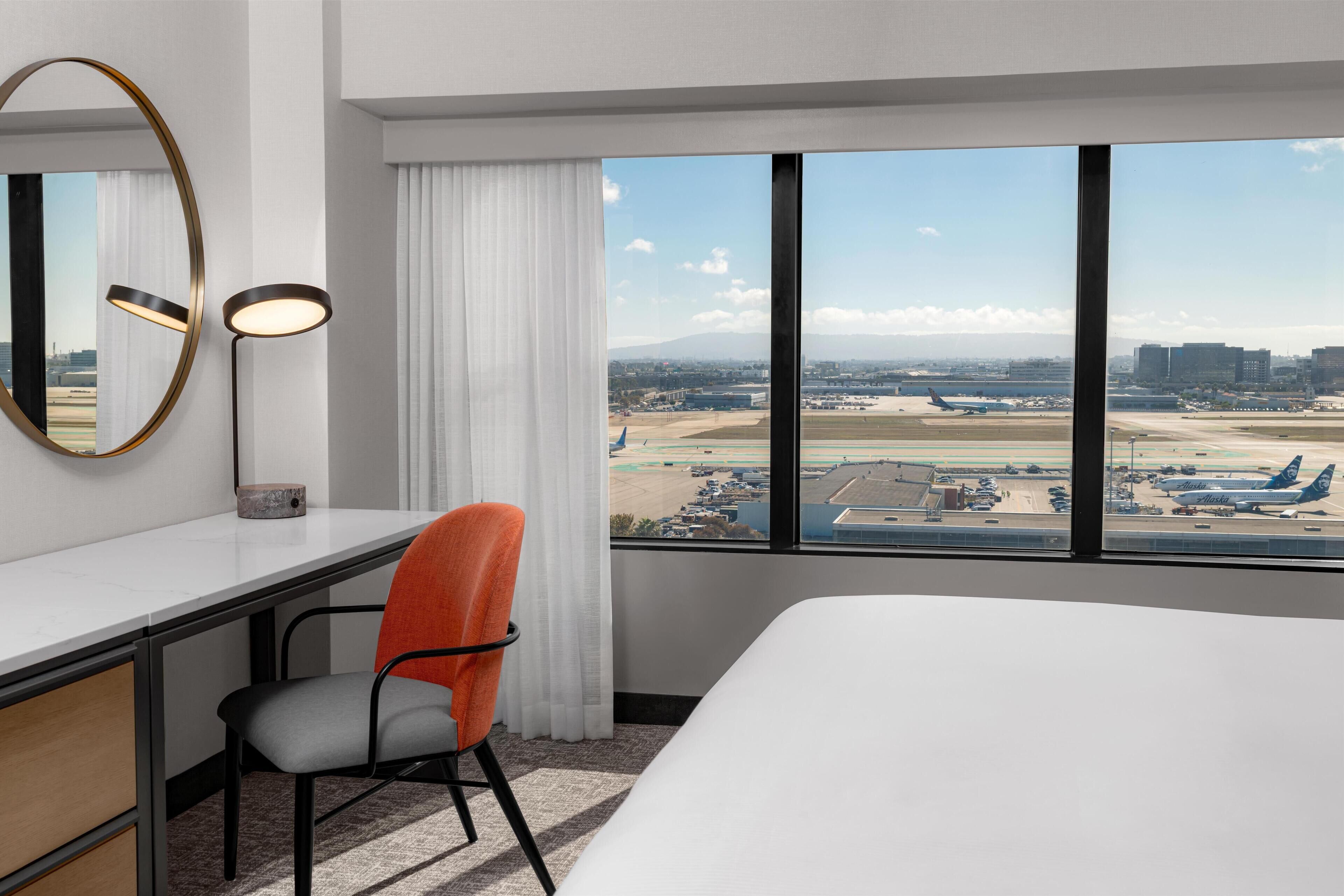 Room, 1 King Bed, Bay View (Runway View) | Premium bedding, pillow-top beds, in-room safe, desk