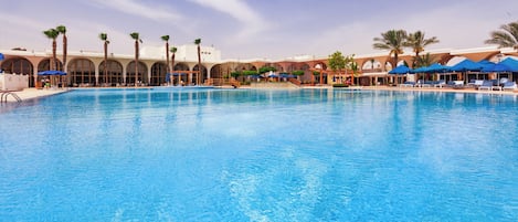 Outdoor pool, open 9:00 AM to 6:00 PM, cabanas (surcharge)