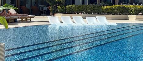 Outdoor pool, open 9:00 AM to 6:00 PM, cabanas (surcharge)