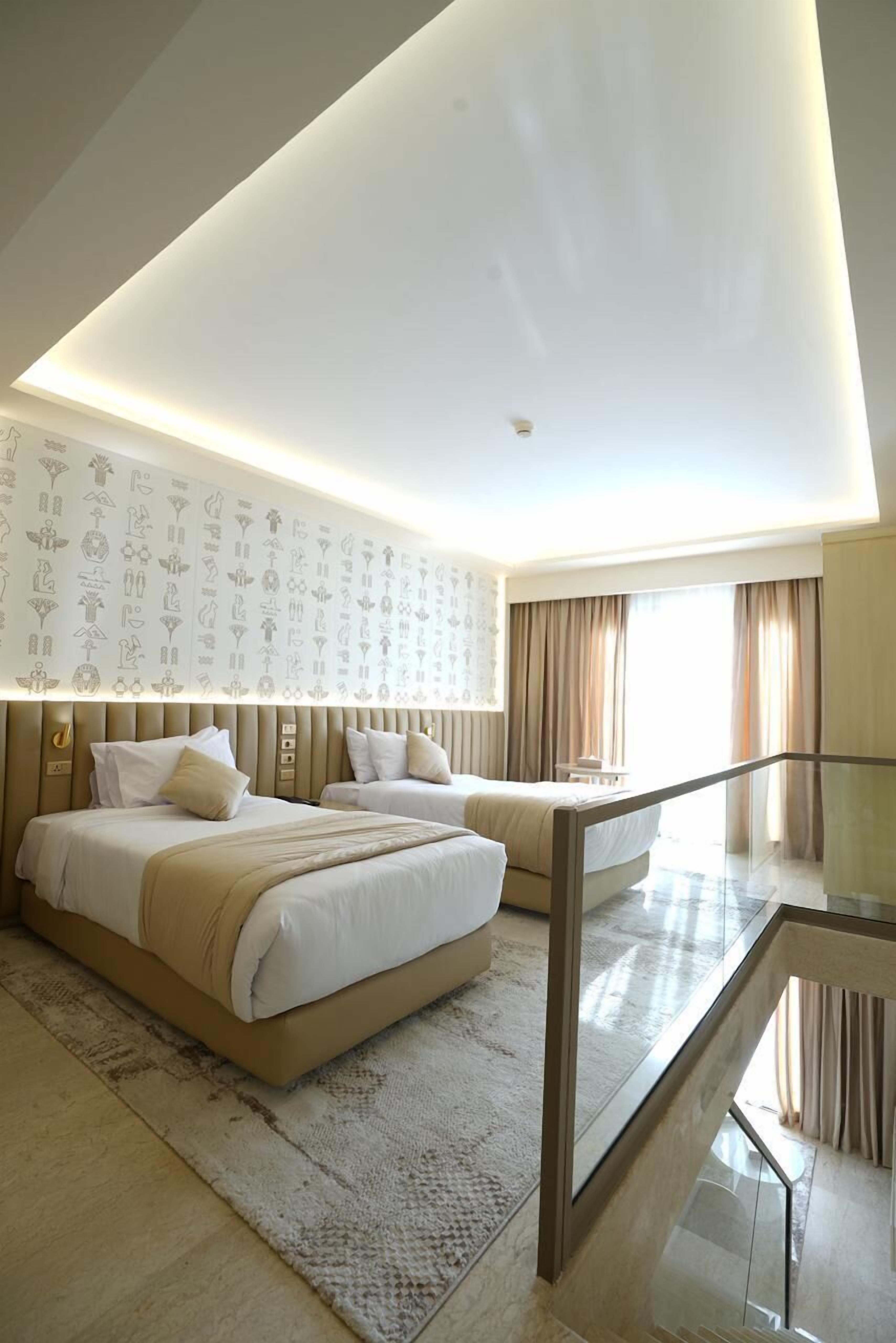 Deluxe Σουίτα | Σεντόνια από αιγυπτιακό βαμβάκι, μίνι μπαρ, χρηματοκιβώτιο στο δωμάτιο 