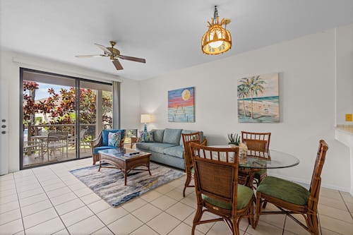 Suite, 2 Bedrooms, Garden View | Living area | 42-inch TV with cable channels, DVD player