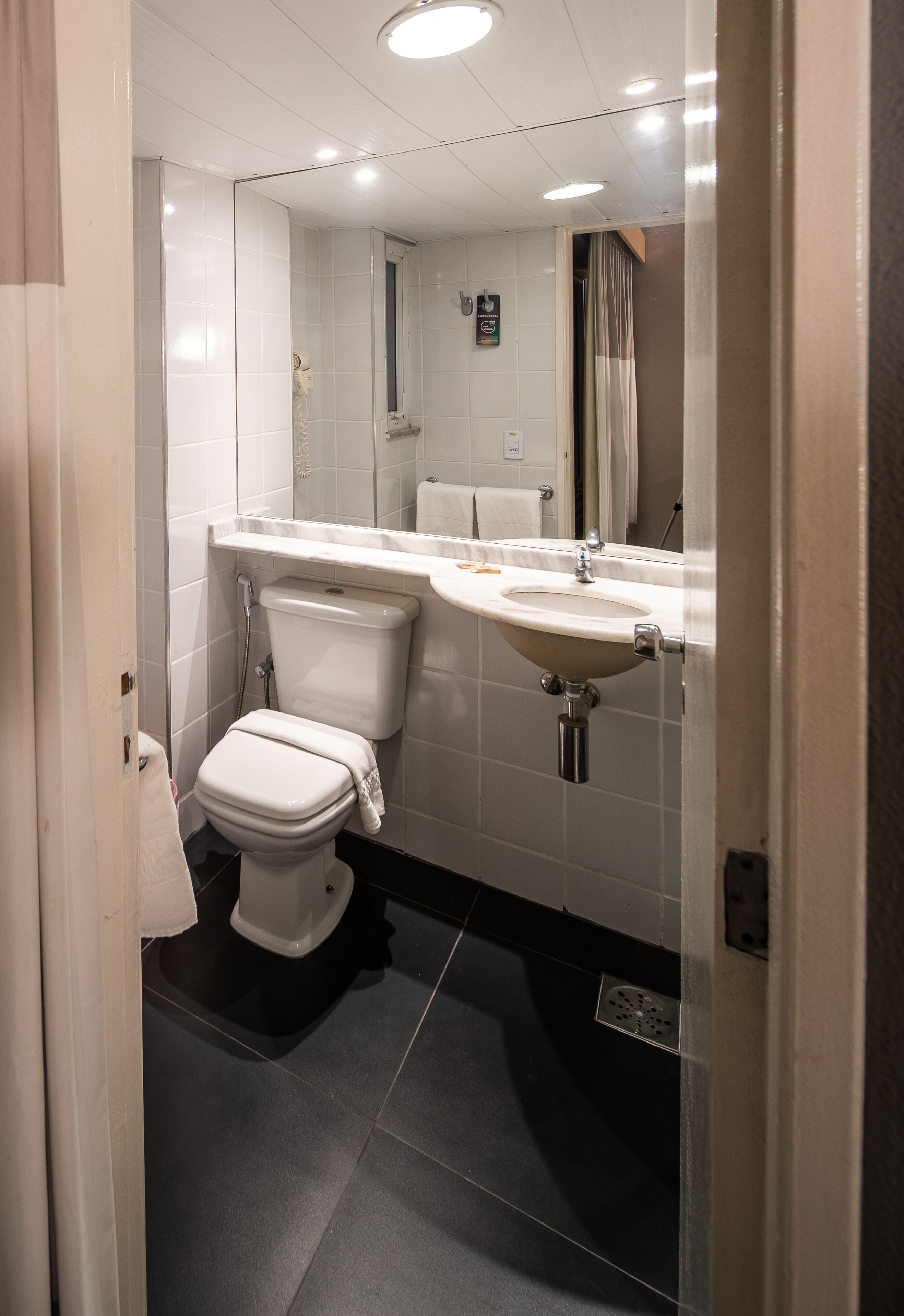 shower, eco-friendly toiletries, hair dryer, towels