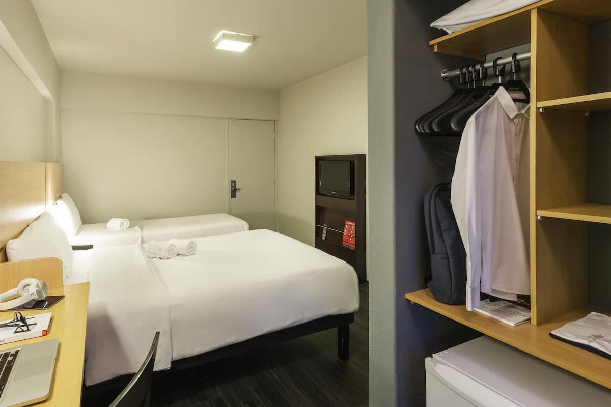 Desk, blackout curtains, free cots/infant beds, free WiFi