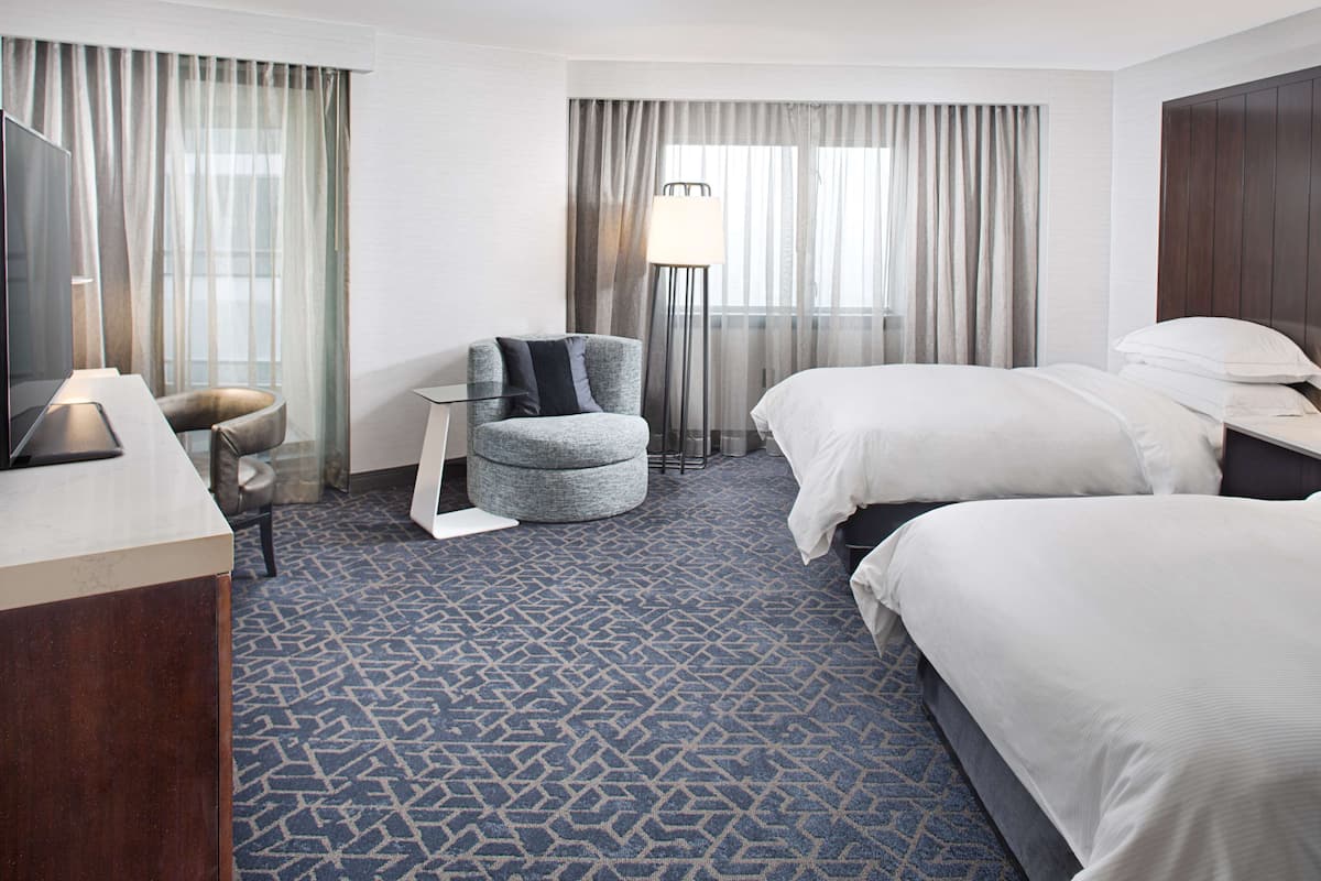 Premium bedding, down duvets, pillow-top beds, in-room safe