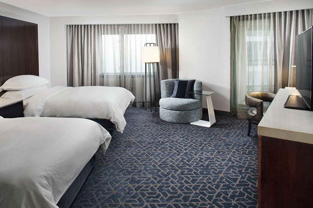 Premium bedding, down duvets, pillow-top beds, in-room safe