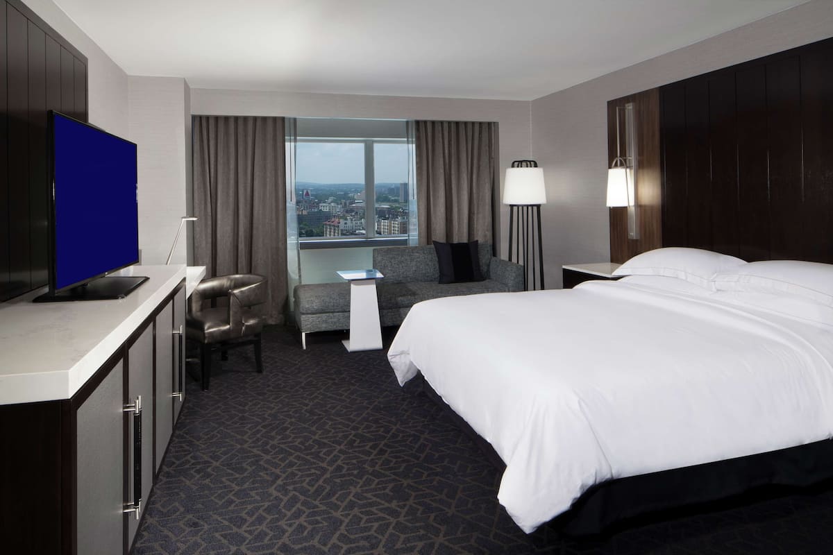 Premium bedding, down duvets, pillow-top beds, in-room safe