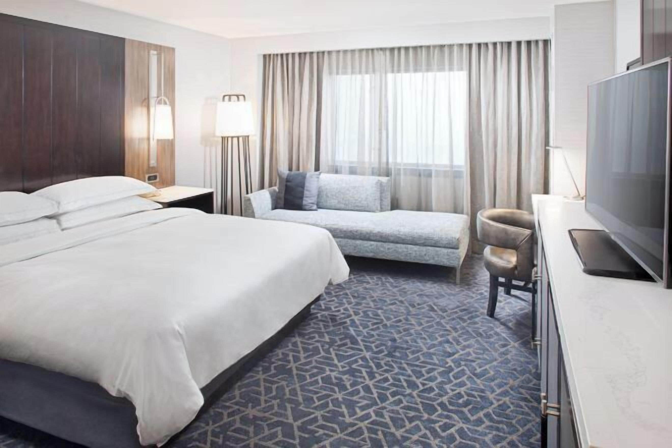 Premium bedding, down comforters, pillowtop beds, in-room safe