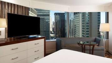 Premium bedding, down comforters, pillowtop beds, in-room safe