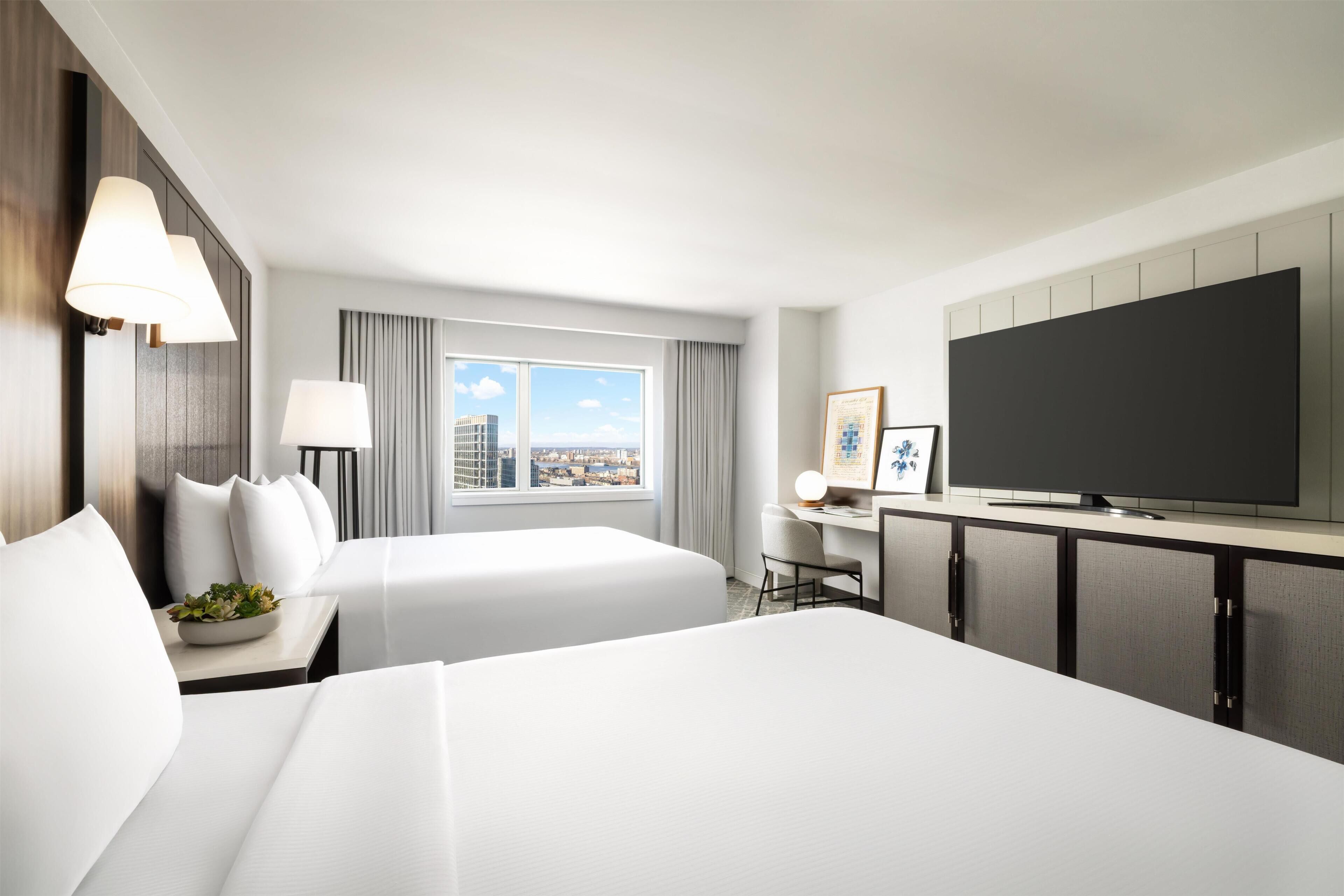 Premium bedding, down comforters, pillowtop beds, in-room safe