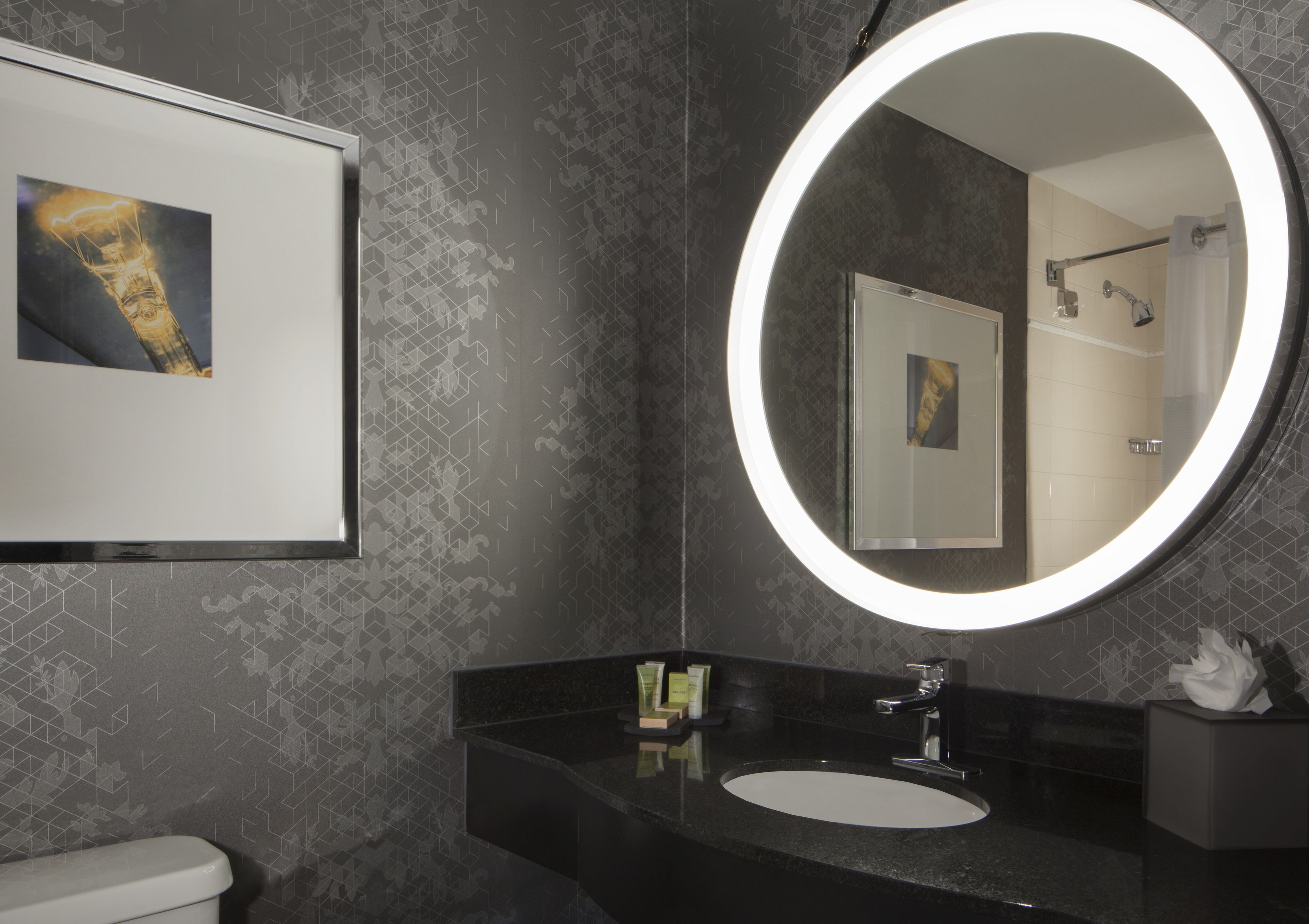 shower, designer toiletries, hair dryer, towels