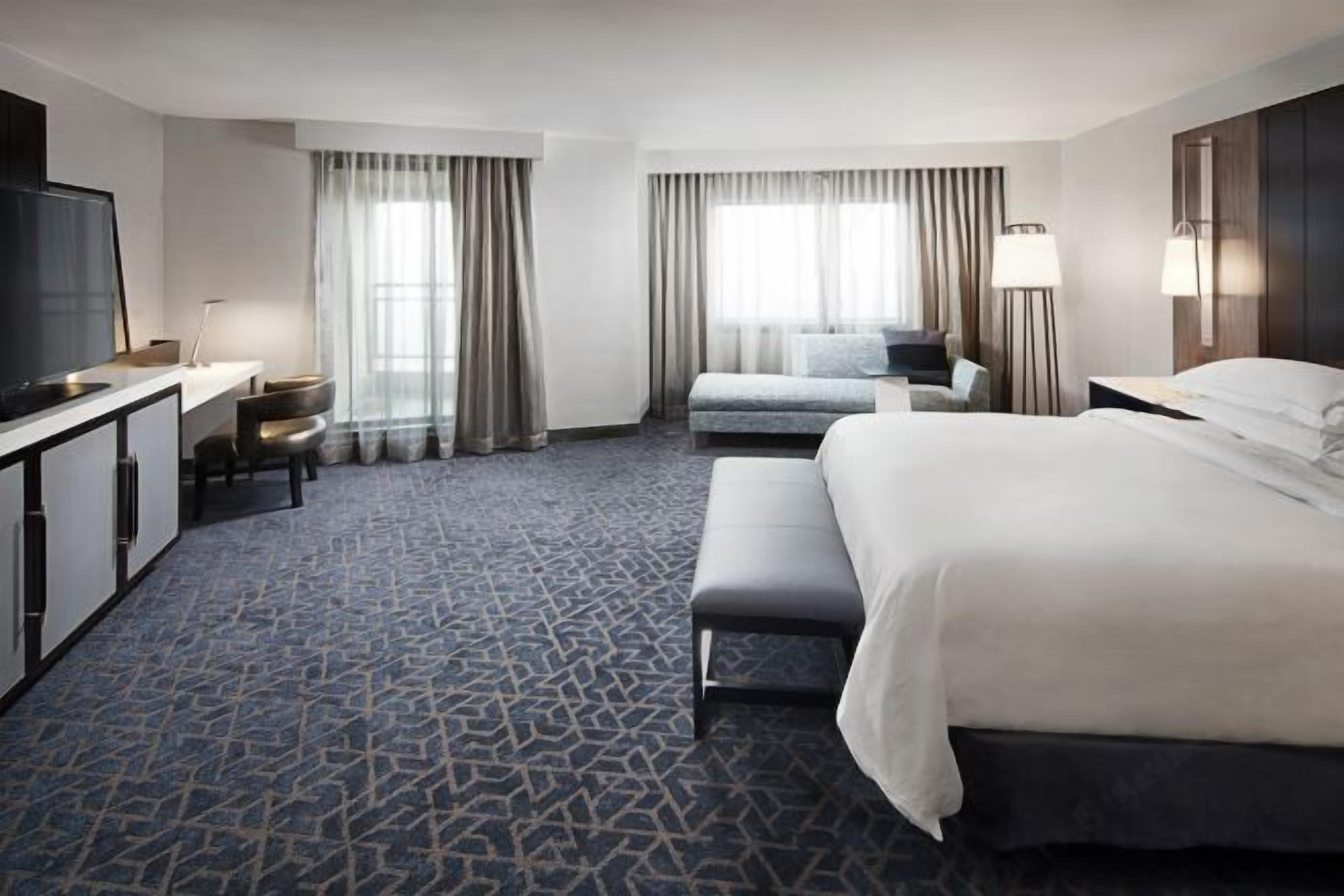 Premium bedding, down comforters, pillowtop beds, in-room safe