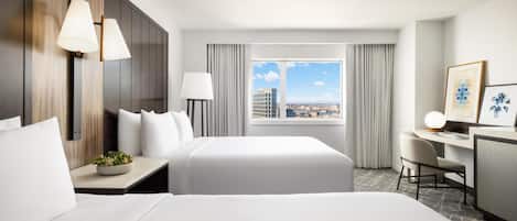 Premium bedding, down comforters, pillowtop beds, in-room safe