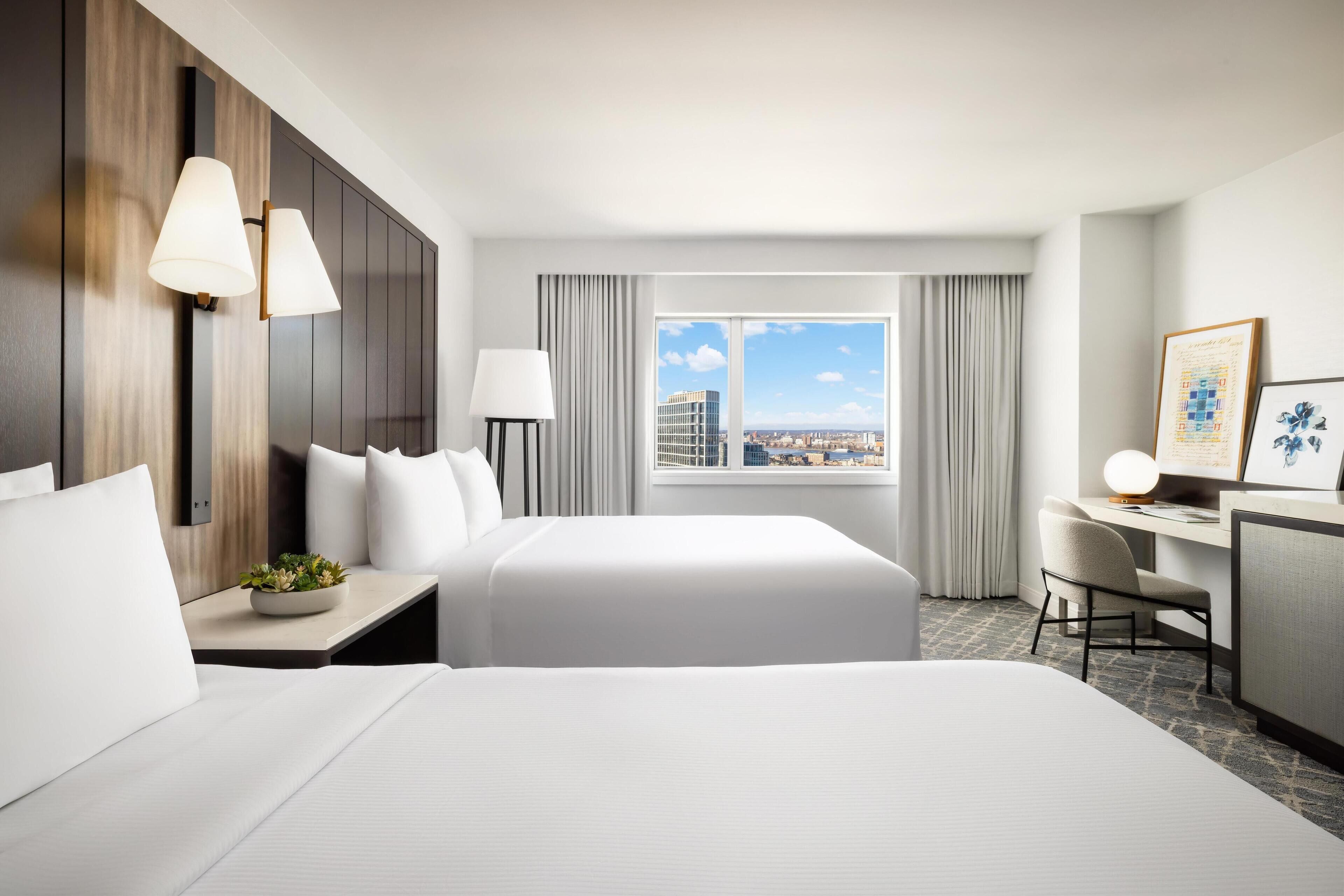 Premium bedding, down comforters, pillowtop beds, in-room safe