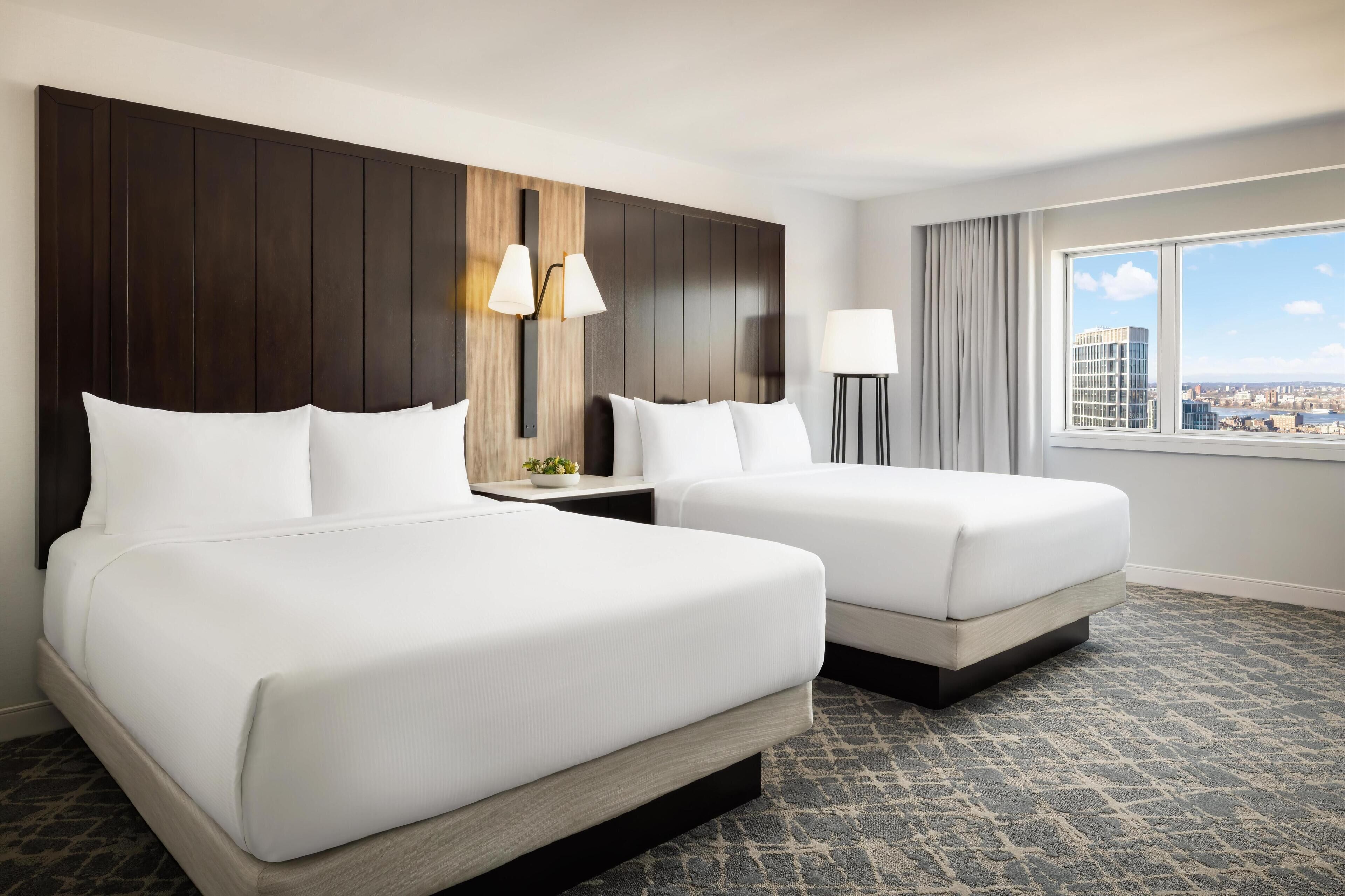 Premium bedding, down comforters, pillowtop beds, in-room safe