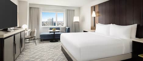Premium bedding, down duvets, pillow-top beds, in-room safe