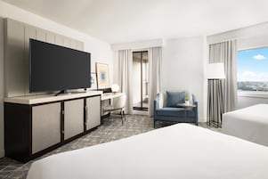 Premium bedding, down comforters, pillowtop beds, in-room safe