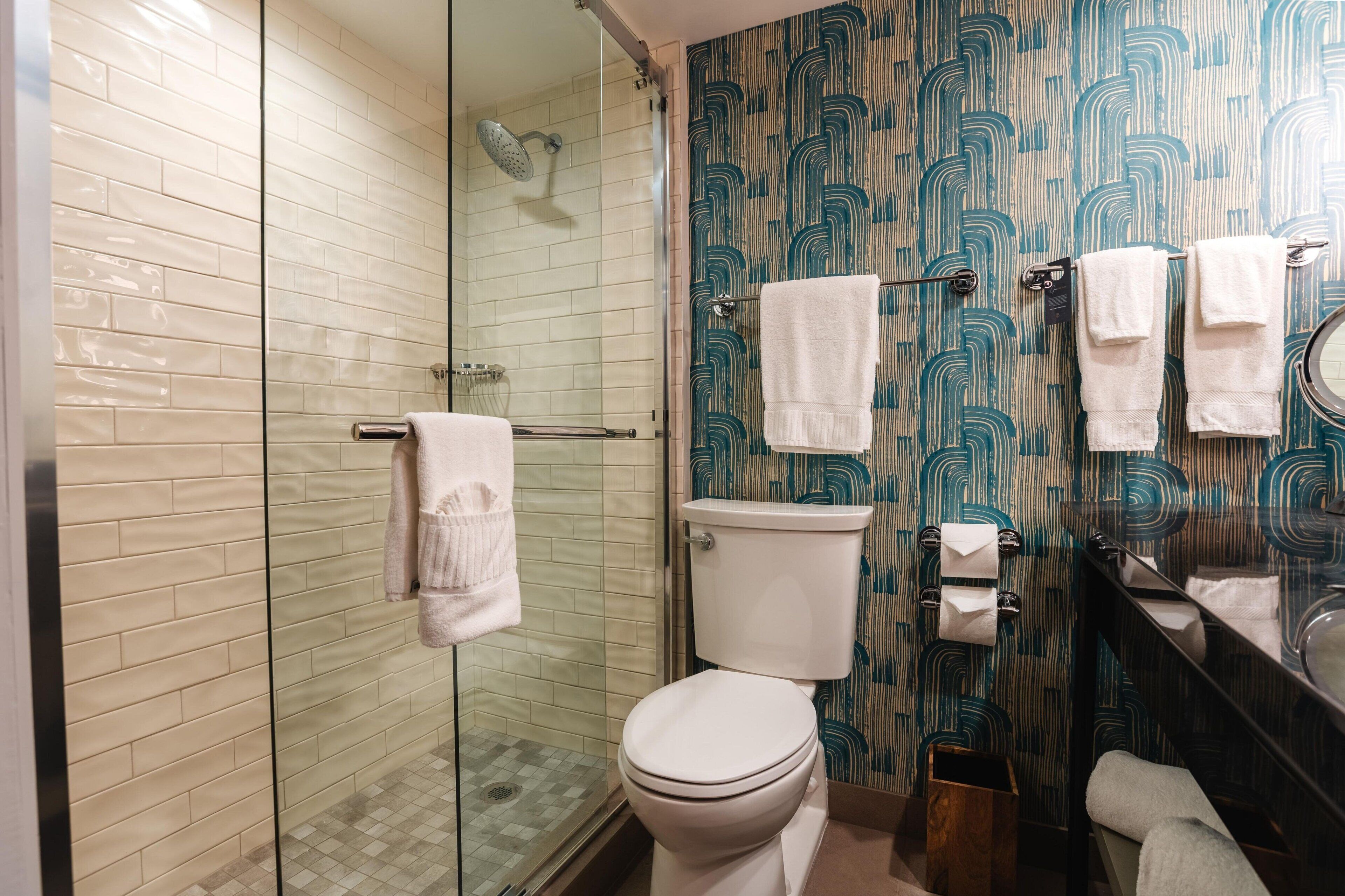Eco-friendly toiletries, hair dryer, towels