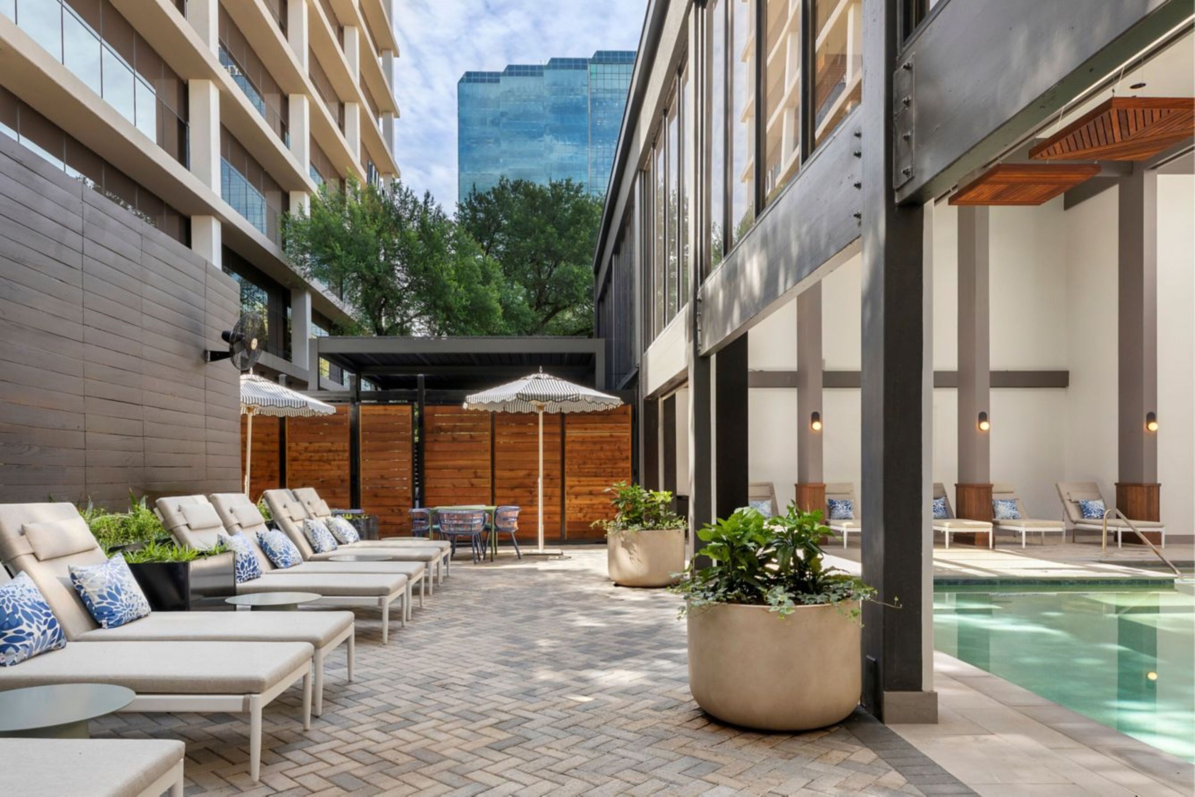Indoor pool, open 7:00 AM to 10:00 PM, pool umbrellas, pool loungers