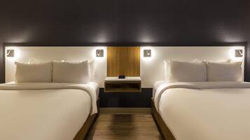 Premium bedding, pillowtop beds, desk, laptop workspace