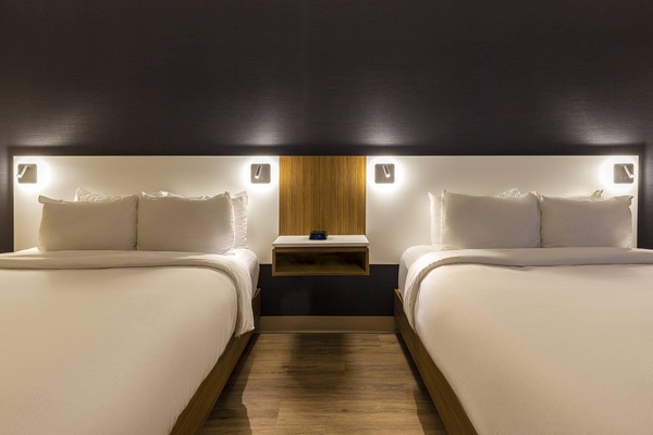 Premium bedding, pillowtop beds, desk, laptop workspace