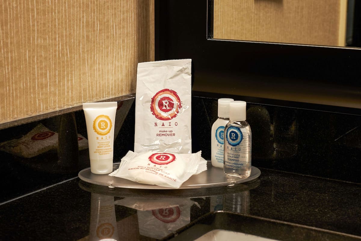 premium bedding, pillow-top beds, desk, laptop workspace