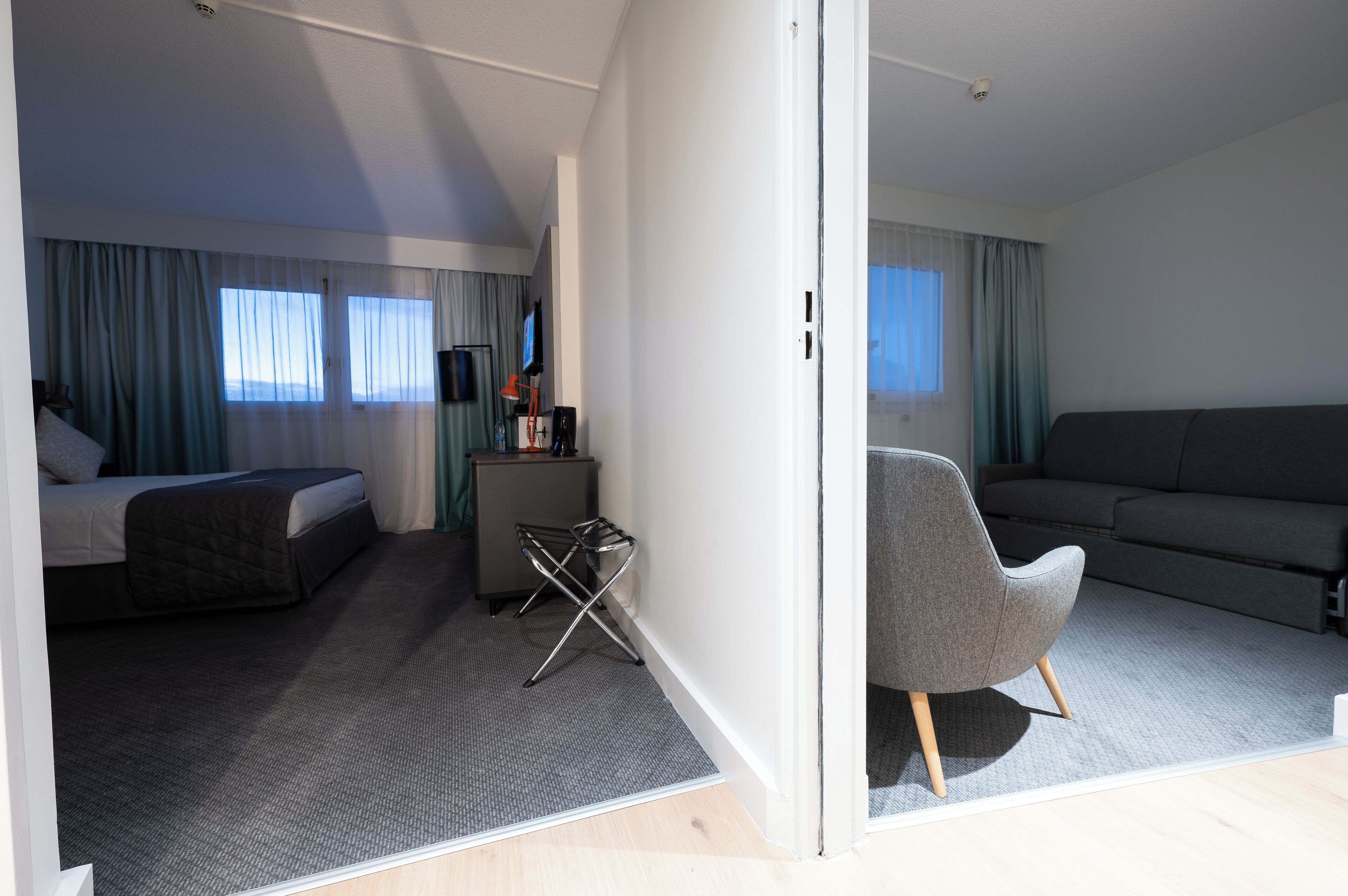 Suite, 1 Queen Bed, City View | Minibar, desk, blackout drapes, iron/ironing board