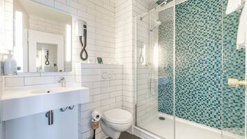 Eco-friendly toiletries, hair dryer, towels