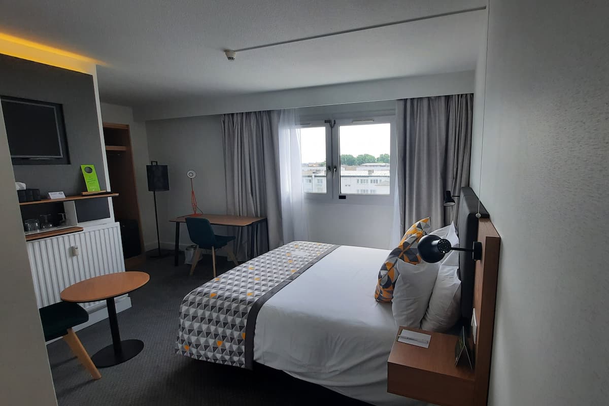 Minibar, desk, blackout drapes, iron/ironing board