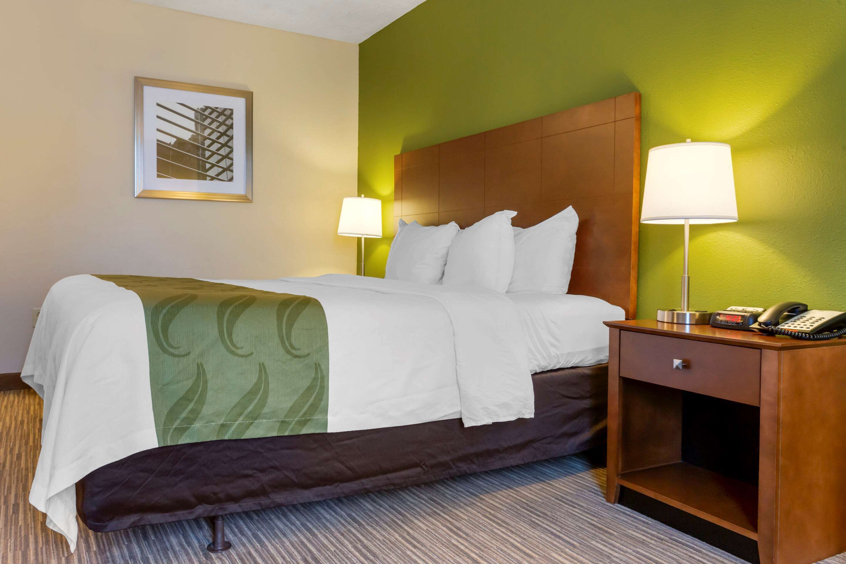 premium bedding, desk, blackout curtains, iron/ironing board