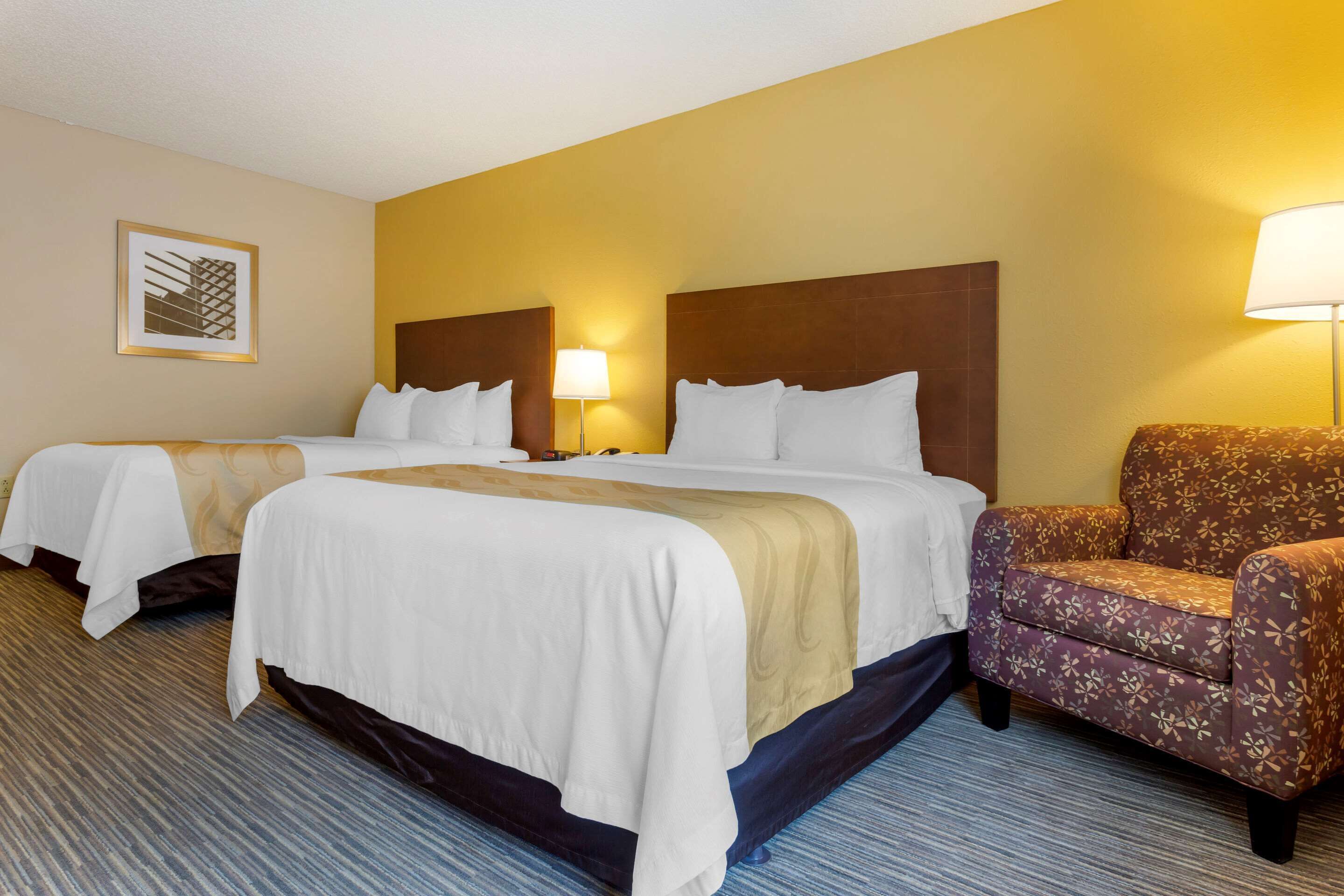 premium bedding, desk, blackout curtains, iron/ironing board