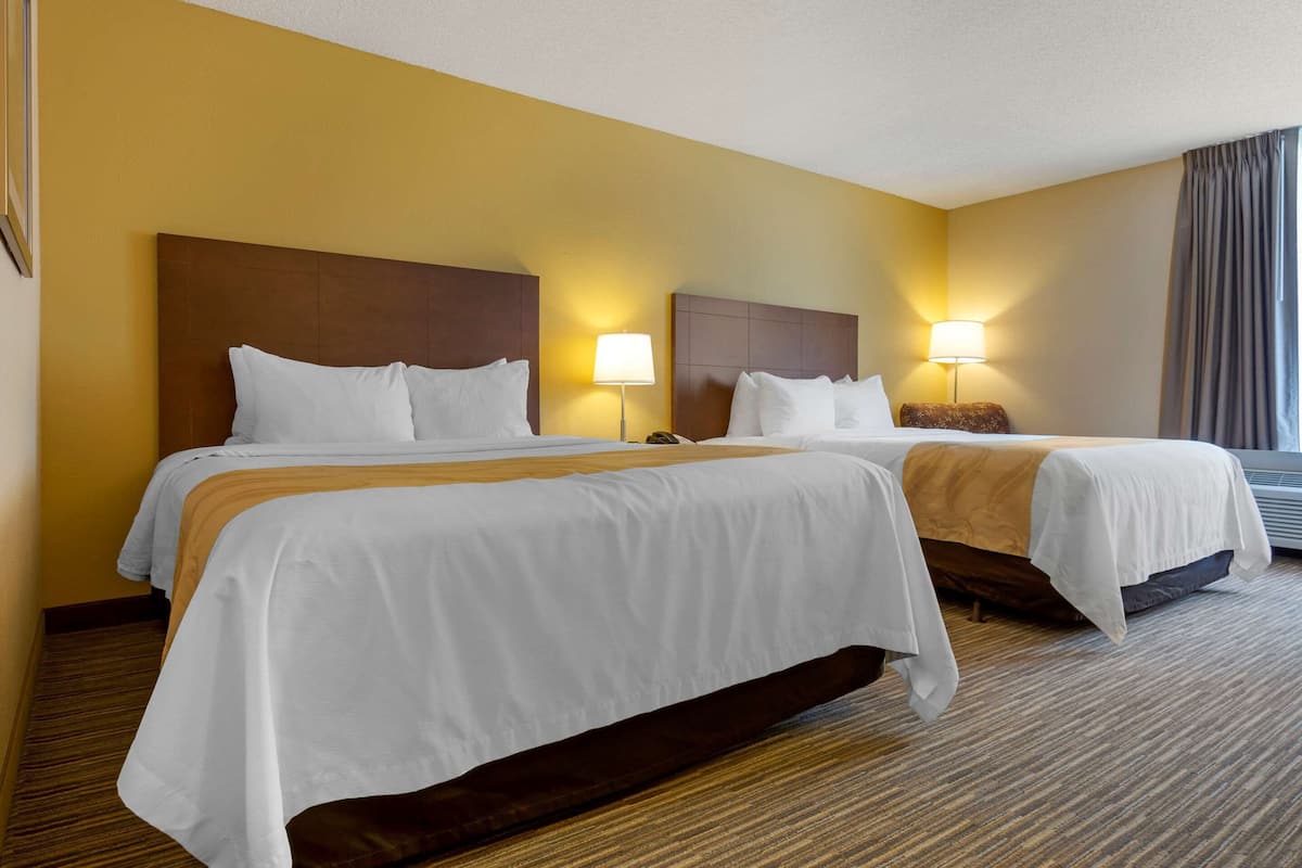 premium bedding, desk, blackout curtains, iron/ironing board