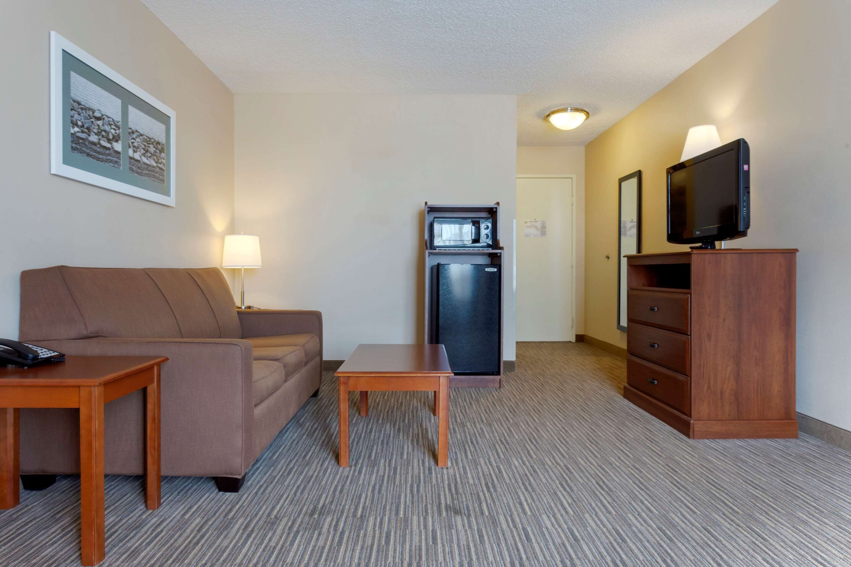 premium bedding, desk, blackout curtains, iron/ironing board