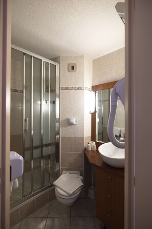 Shower, eco-friendly toiletries, hair dryer, towels