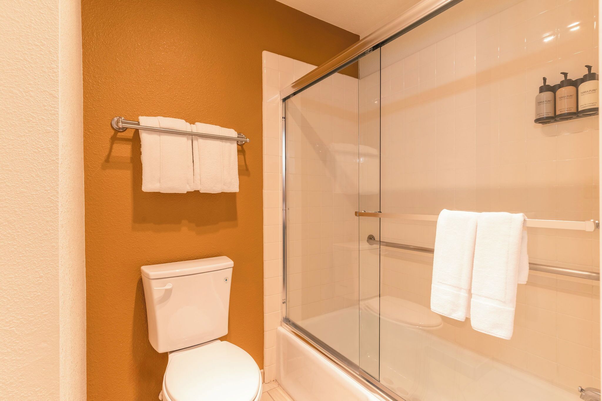 family room | bathroom | shower, eco-friendly toiletries, hair dryer, towels