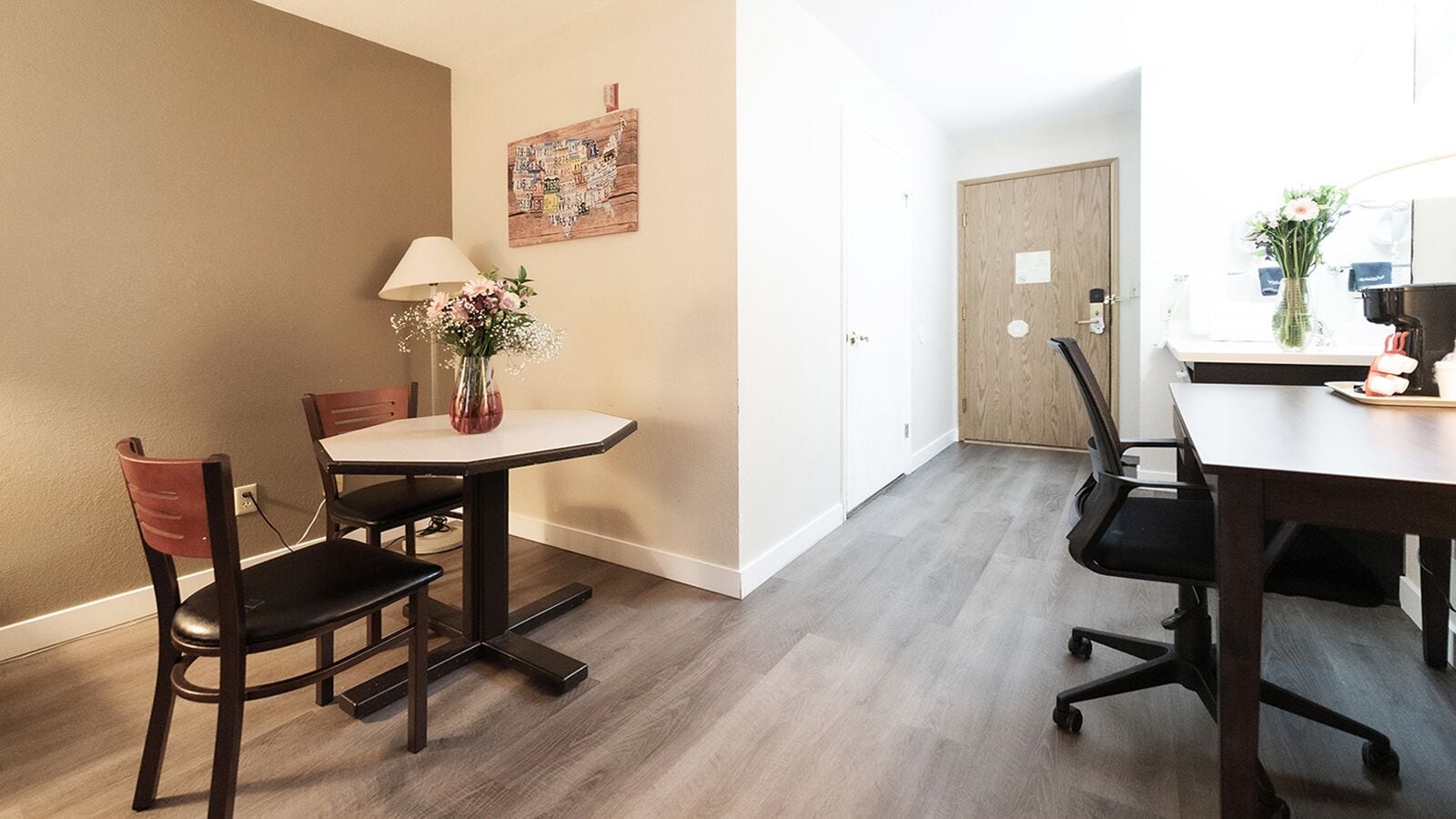 Desk, laptop workspace, blackout drapes, iron/ironing board