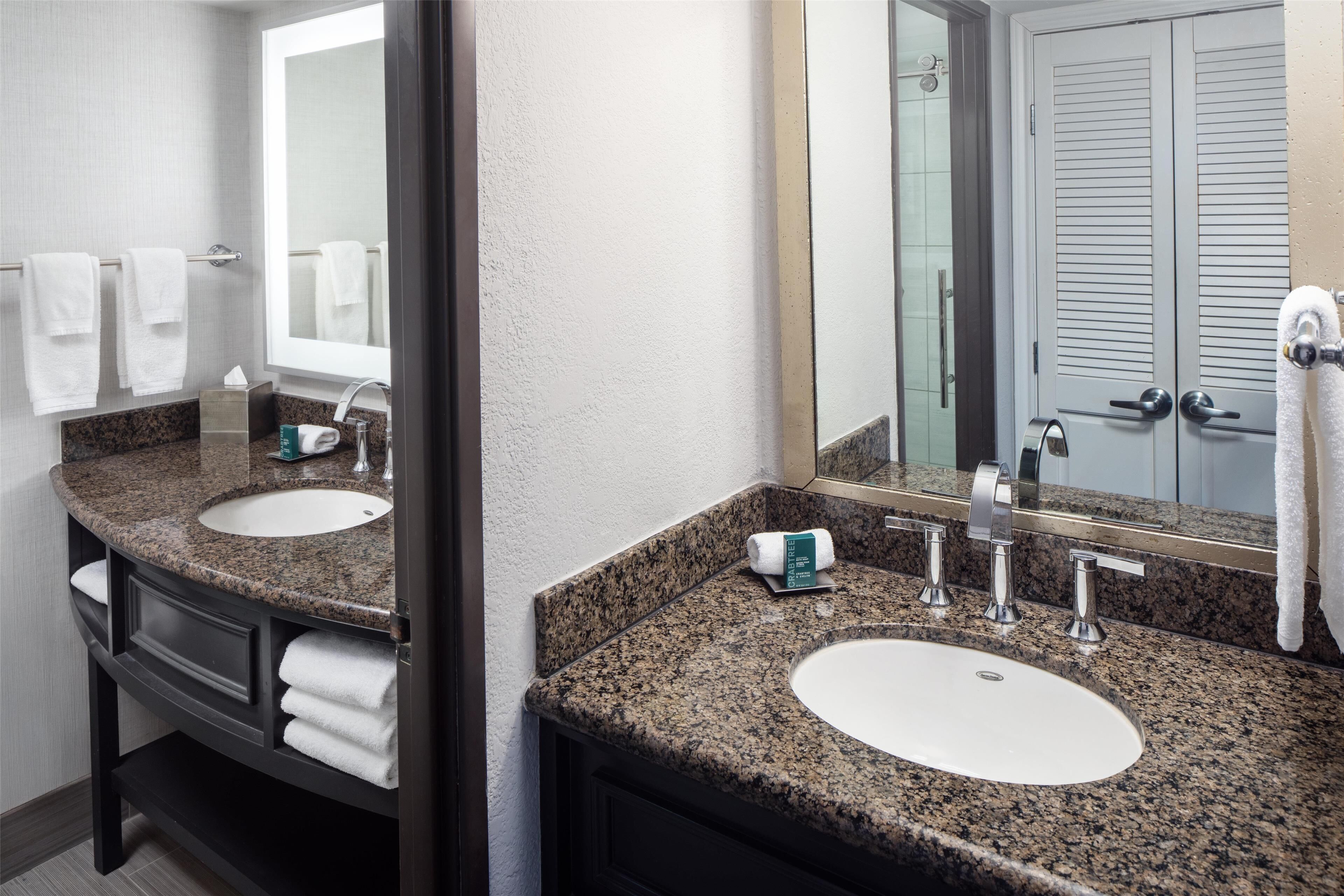 junior suite, 1 king bed | bathroom | combined shower/bathtub, designer toiletries, hair dryer, towels