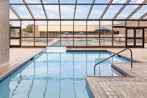 Outdoor pool, open 6:00 AM to 10:00 PM, pool loungers
