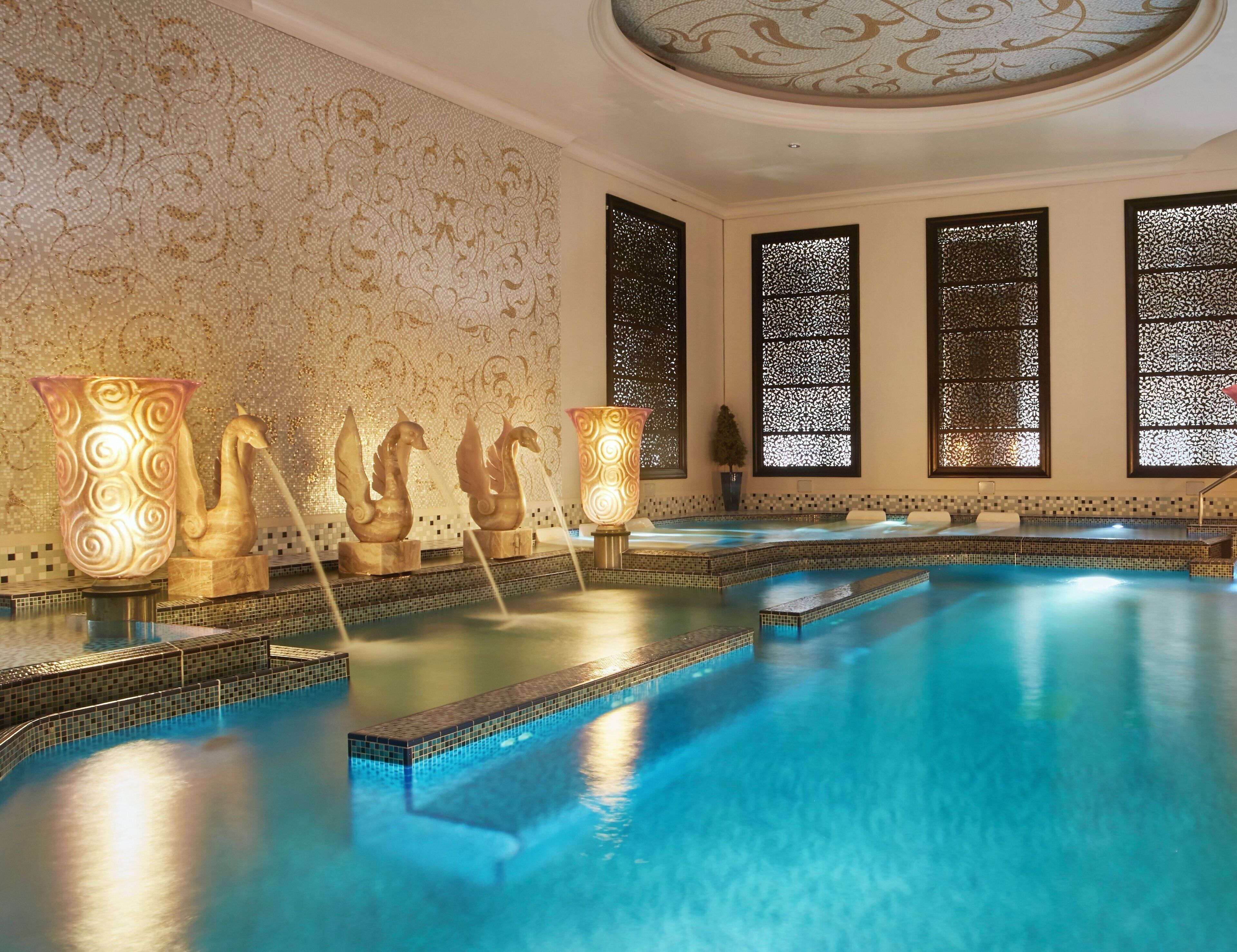 Indoor pool, outdoor pool, pool umbrellas, pool loungers